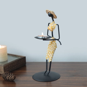 Porte-bougie africain en fer avec figurine féminine et décor en tissu floral