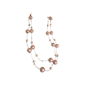 Champagne layered pearl necklace with varied bead sizes in a long minimalist style