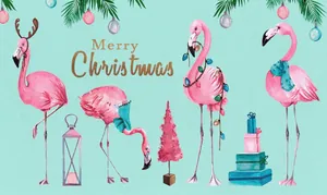 Detail of a Merry Christmas mat with pink flamingos and festive lights on a blue base