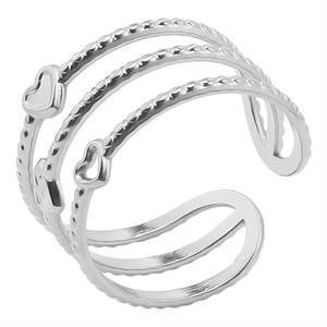 Macro shot of silver multi-layer open ring with twisted texture and heart details