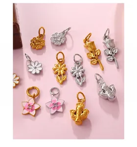 Detailed view of DIY metal flower charms featuring daisy and rose with enamel finish