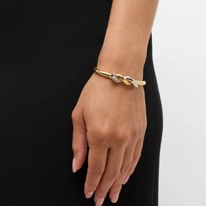18k gold plated two-tone twisted knot stainless steel bangle bracelet for women