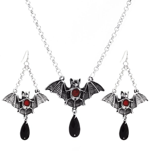 Gothic bat necklace and earrings set with red gems and black teardrop pendants