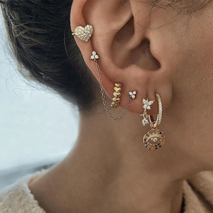 Gold heart ear cuff and butterfly stud set with cubic zirconia and evil eye charm