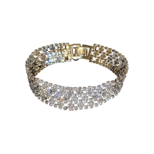 Sparkling five-row rhinestone bracelet with silver metal base and secure fold-over clasp