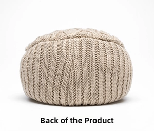 Behind view of beige knitted beanie showing thick ribbed texture and cable knit details