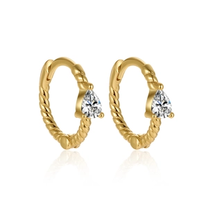 Detailed close-up of golden rope-textured hoop earrings with pear-cut zircon drops