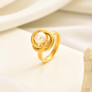 French style gold titanium ring featuring a white pearl and multi-layered band design