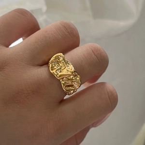 Minimalist gold irregular lava texture ring featuring a stylish crinkled metallic design