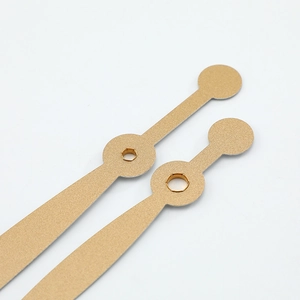 Matte gold quartz clock hands with sandblasted finish and hexagonal mounting holes
