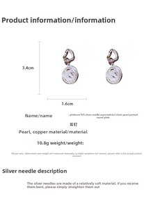 Detail view of asymmetric pearl portrait earrings with 3.4cm x 1.6cm size measurements