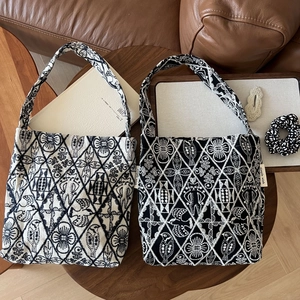 Retro ethnic style embroidered canvas tote bag with intricate bird and floral patterns