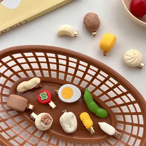 Cute food-shaped hair clips featuring simulation egg, bun, and snacks with metal duckbill clip