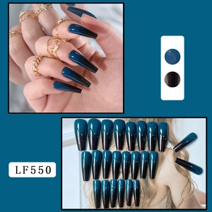 Detail of long coffin dark blue to black gradient press-on nails set with model view