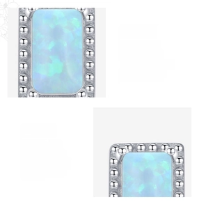Macro view of rectangular light blue opal stud earrings set in S925 sterling silver
