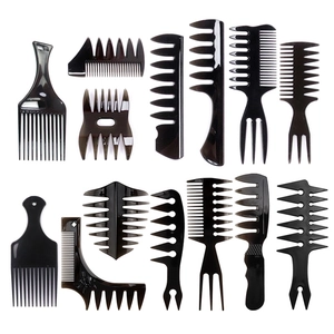 Set of black professional hair combs with wide and fine teeth on white background