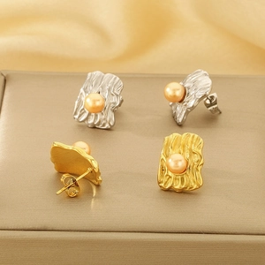 Irregular textured square stainless steel stud earrings with centered pearl inlay