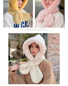 Detail of plush hood scarf set in beige, pink, and yellow showing the faux fur texture