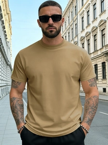 Outdoor street style view of khaki cotton blend men's t-shirt in regular slim fit