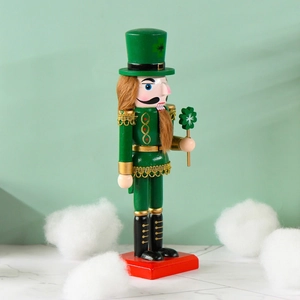 25cm Green St. Patrick's Day wooden nutcracker with lucky clover on a marble table