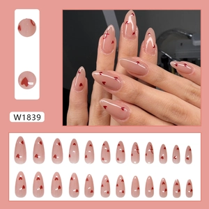 24pcs almond press-on nails featuring nude base and red heart patterns in glossy finish
