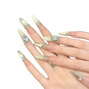 Golden gradient stiletto press-on nails with luxury rhinestones and crystal accents