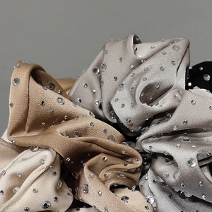 Elegant satin rhinestone scrunchies in gold, silver, and black for women's hair styling