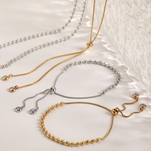 Verstellbares Edelstahl Perlen Schmuckset mit Zirkonia Anhängern in Gold und Silber Optik