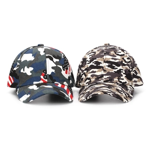 Detail of camouflage baseball caps featuring American flag design and classic grey patterns