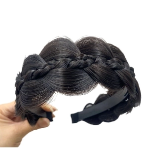 Handcrafted black fishtail braid headband made of synthetic hair for volume enhancement