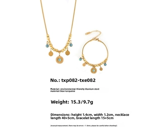 Detailed view of gold plated titanium steel turquoise disc necklace and bracelet set