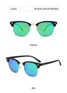 Detail of Clubmaster sunglasses with black gold frame and green mirrored lenses