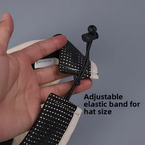 Detail of 100% nylon sports sun visor with adjustable black elastic strap and buckle