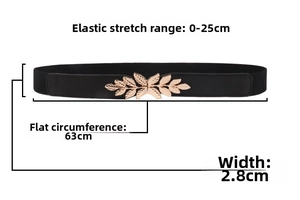 Detail showing elastic black waist belt with golden leaf buckle and texture