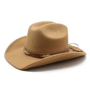 Detail of camel wool felt cowboy hat with stitched leather band and Western accents