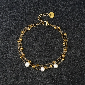 Three-layer 18K gold plated stainless steel bracelet with freshwater pearls and beads