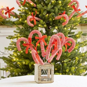 Christmas red and white striped candy cane picks with bows for tree decoration