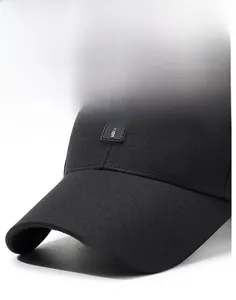 Detail of black baseball cap featuring Narason embroidery and textured synthetic fabric