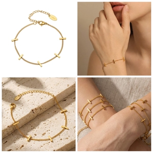 Detail of 18k gold plated stainless steel bar link bracelet with lobster clasp and extension