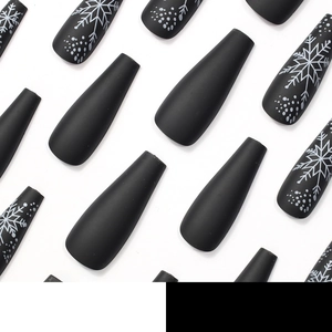 Matte black coffin press-on nails with white snowflake and dot patterns for Christmas