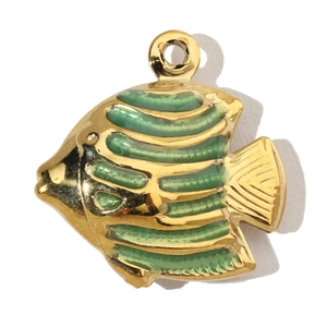 Macro shot of green enamel fish pendant with golden outline and detailed stripes