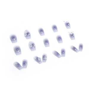 Gradient purple press-on nails with 3D floral, butterfly accents and pearl decorations