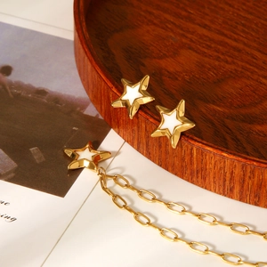 Gold stainless steel star stud earrings and fringe necklace with white enamel inlay