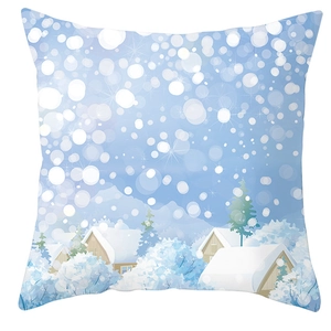 Detail of blue winter landscape pillowcase with snowy house and tree illustration