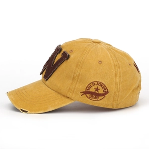 Vintage washed cotton baseball cap with 3D letter W embroidery and distressed brim detail