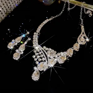 Elegant waterdrop pendant necklace and earrings jewelry set with sparkling rhinestones