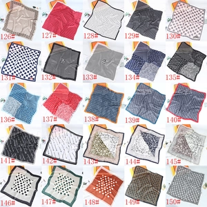 Collage of fashion silk scarves featuring diverse geometric, paisley, and belt patterns
