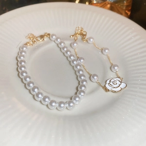 Elegant gold-plated camellia flower and pearl double-layer bracelet set for women