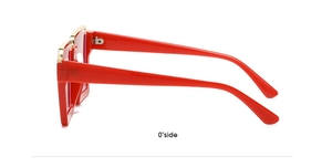 Detail view of red square glasses frame with gold metal bridge and sleek temple design