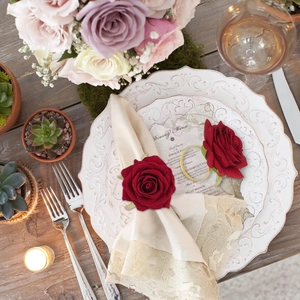 Deep red rose flower napkin rings with gold metal bands for wedding table decor